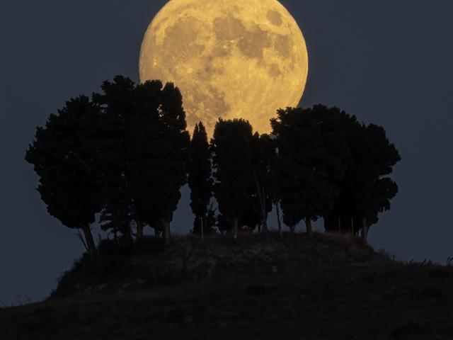 A Harvest Moon over Tuscany