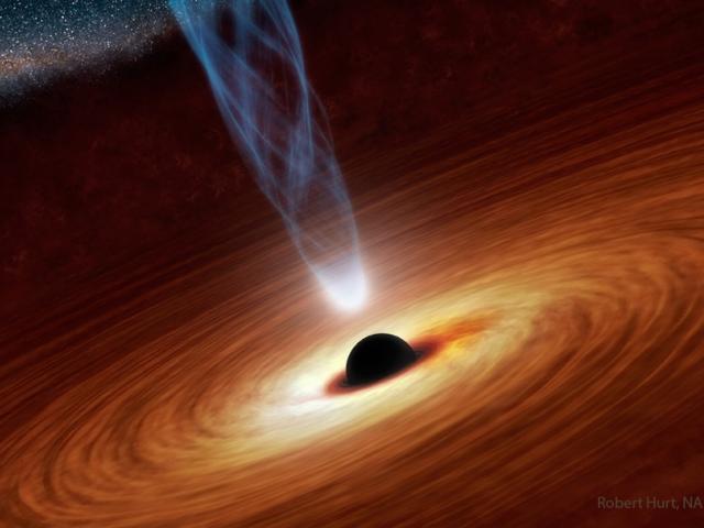 Spin up of a Supermassive Black Hole