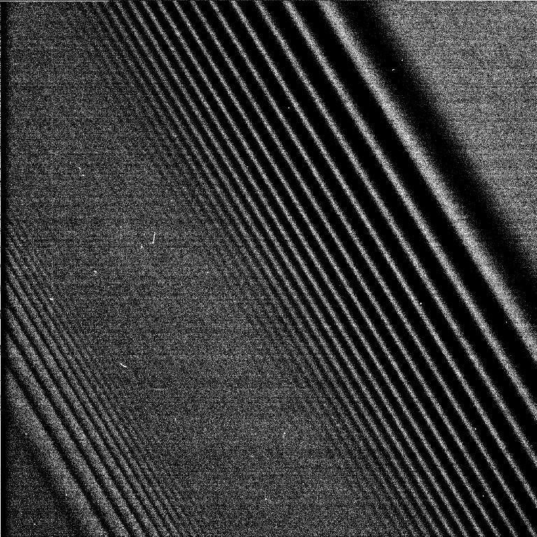 Cassini Images Density Waves in Saturns Rings