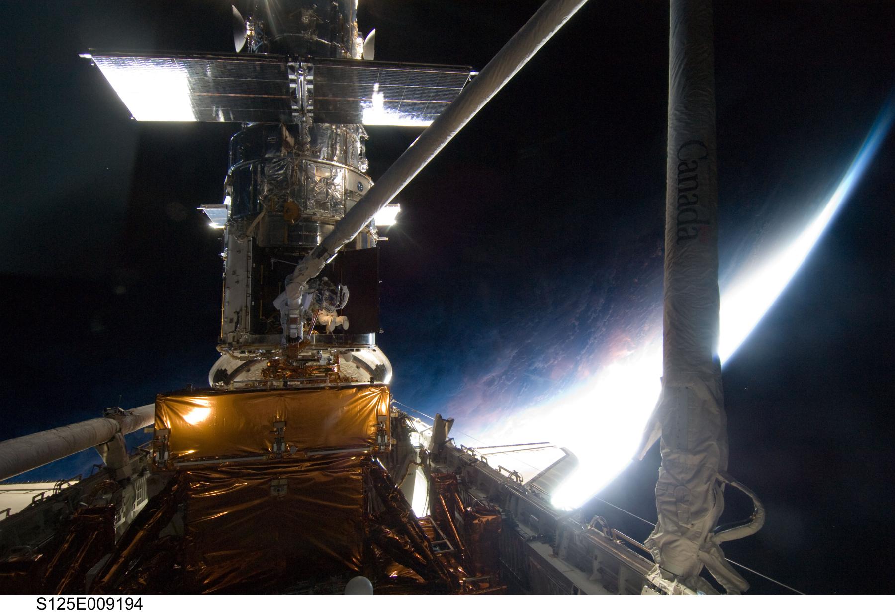 Above Earth Fixing Hubble
