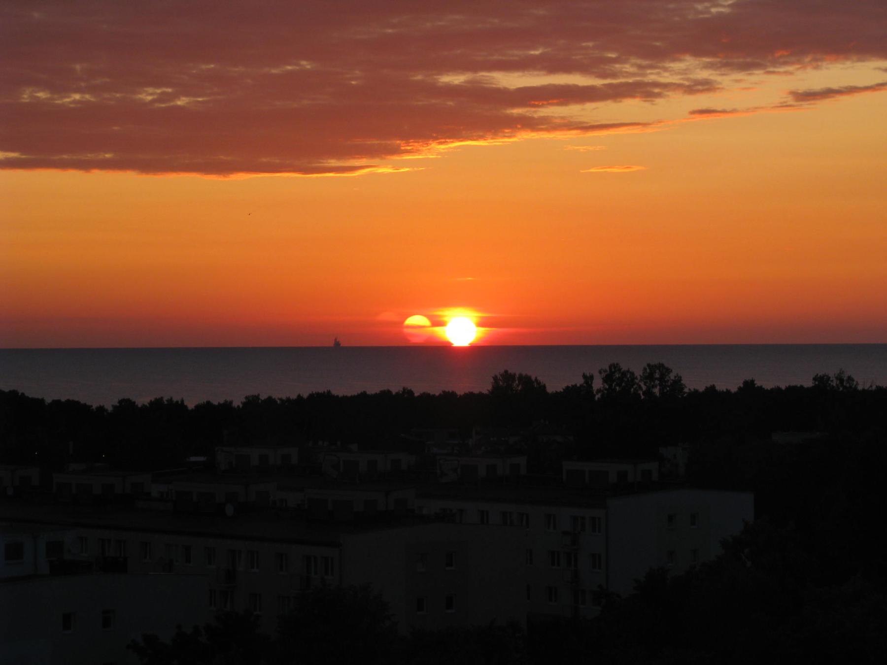 A Triple Sunrise Over Gdansk Bay