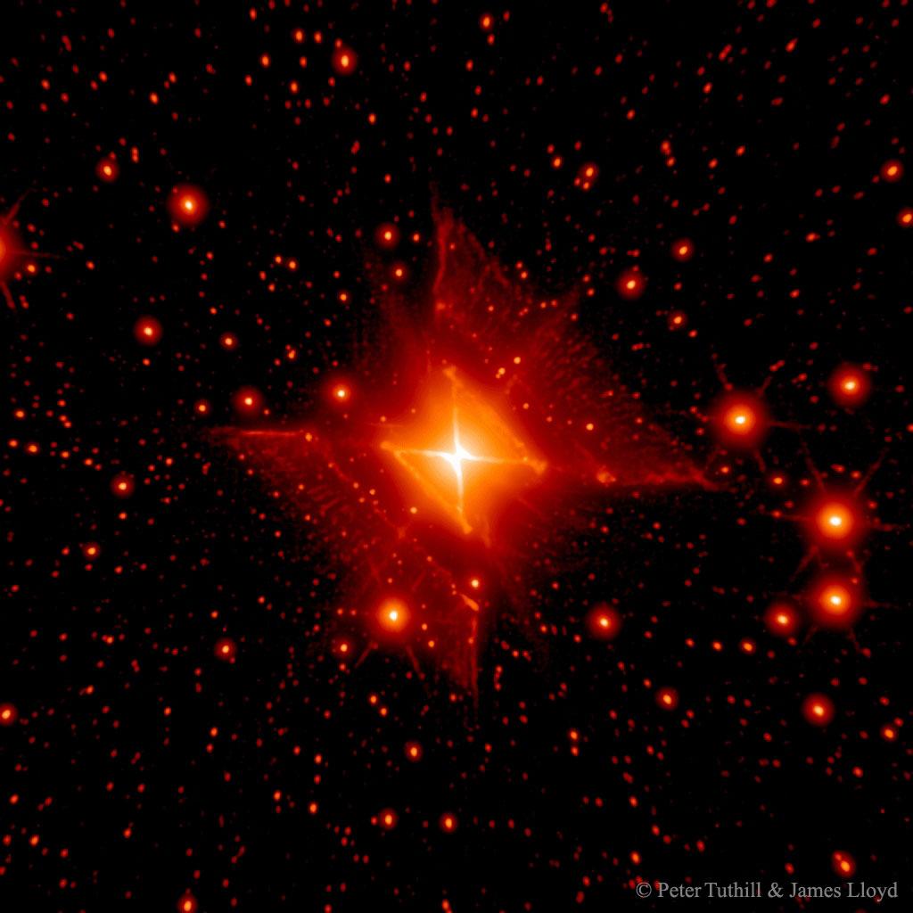 MWC 922: The Red Square Nebula