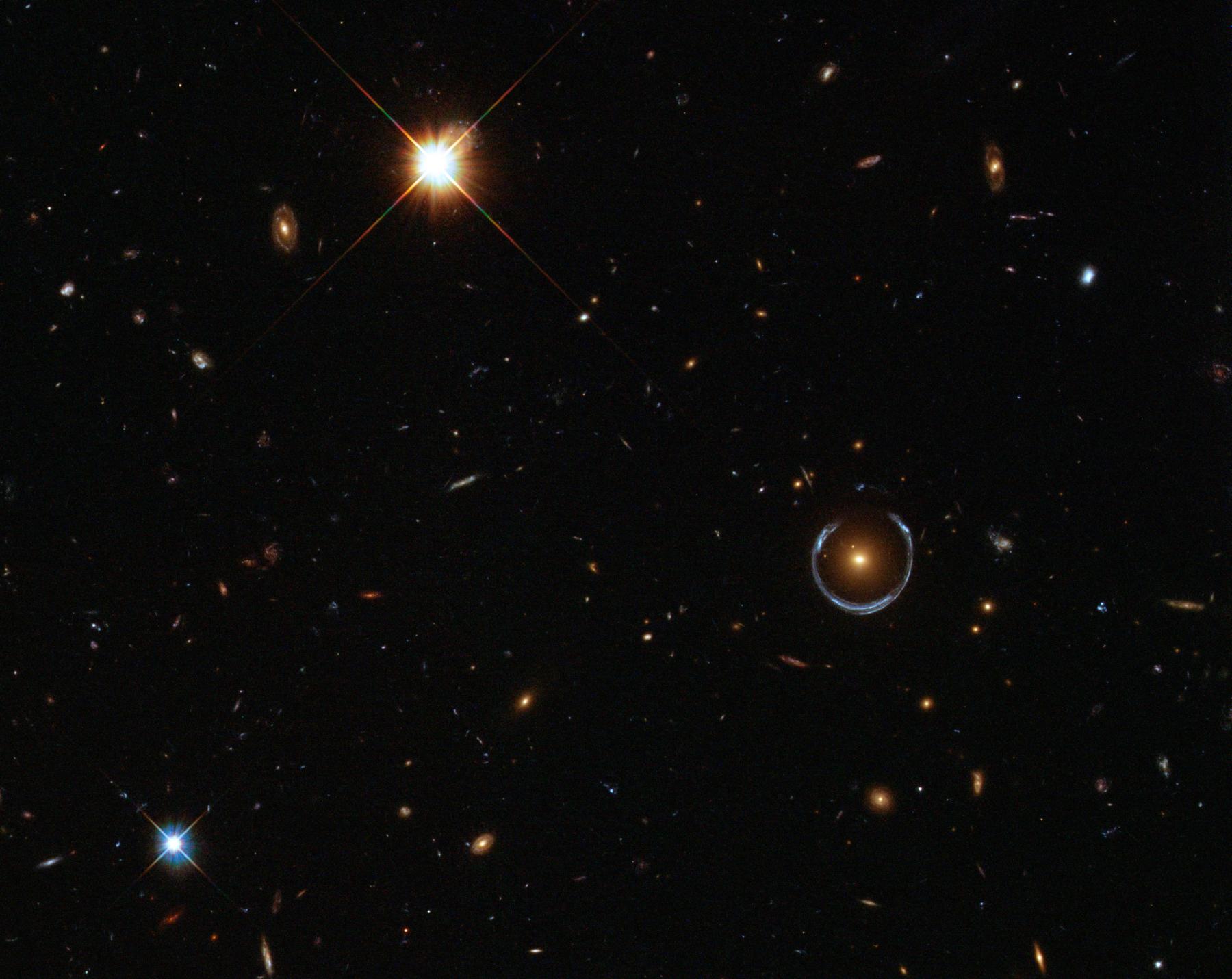 A Horseshoe Einstein Ring from Hubble