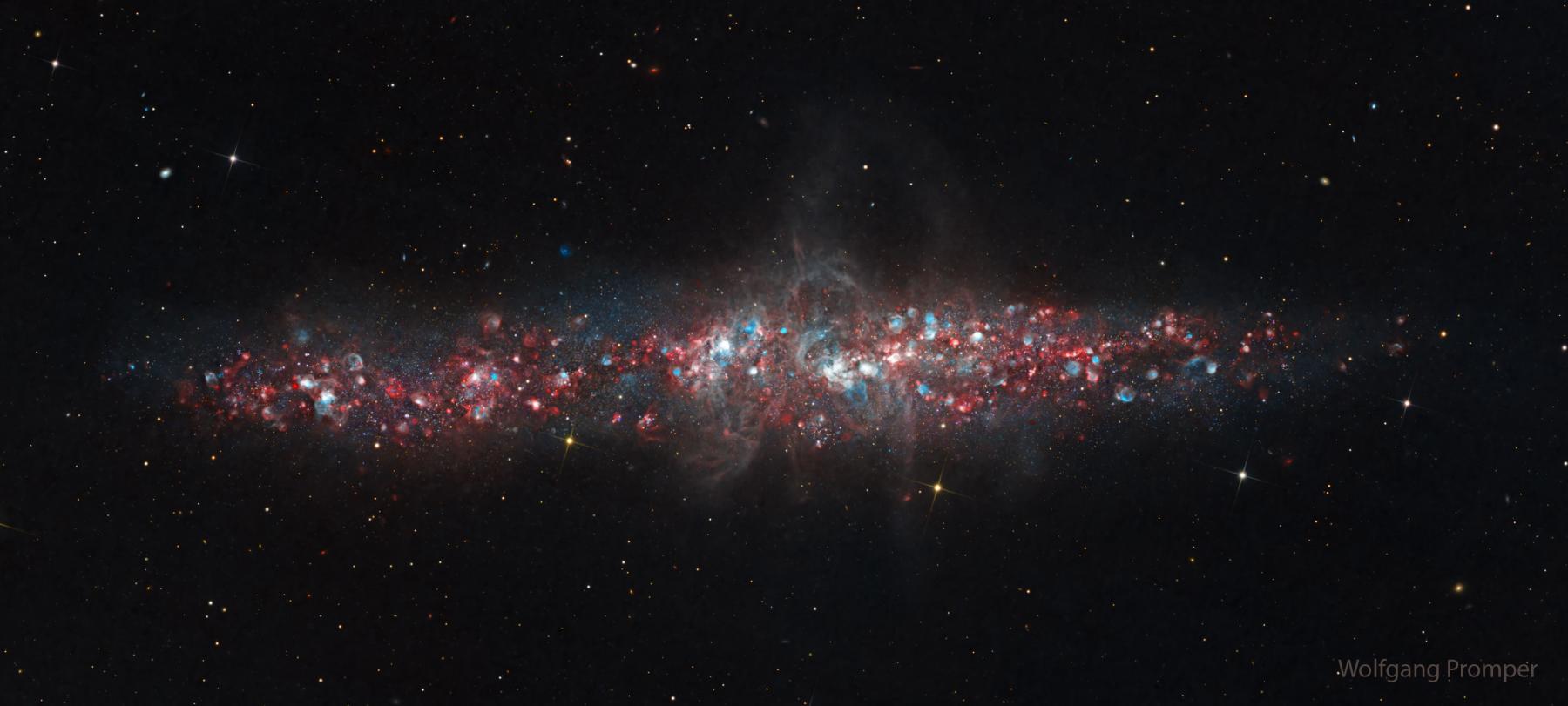 NGC 55: A Galaxy of Nebulas