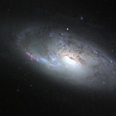 M106: A Spiral Galaxy with a Strange Core
