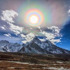 A Colorful Solar Corona over the Himalayas
