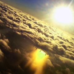 Inverted City Beneath Clouds