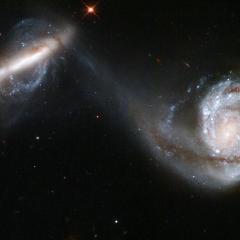 Arp 87: Merging Galaxies from Hubble