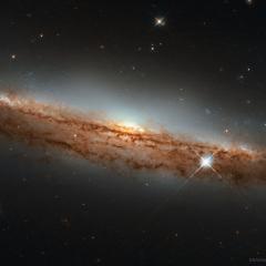 NGC 3717: A Nearly Sideways Spiral Galaxy