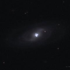 The Einstein Cross Gravitational Lens