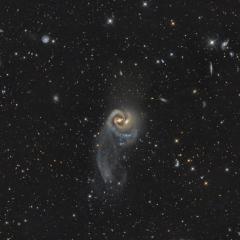 Arp 93: A Cosmic Embrace