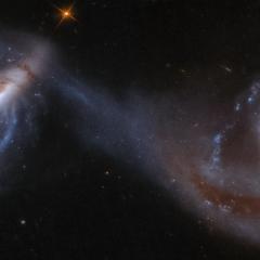 Arp 87: Merging Galaxies from Hubble