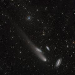 Three Galaxies and a Comet