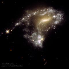 AM1054: Stars Form as Galaxies Collide