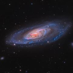 M106: A Spiral Galaxy with a Strange Center