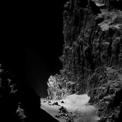 A Kilometer High Cliff on Comet Churyumov Gerasimenko