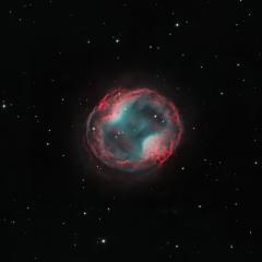 PK 164 +31.1: The Headphone Nebula