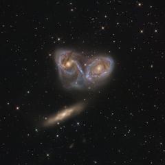 Three Galaxies in Pavo